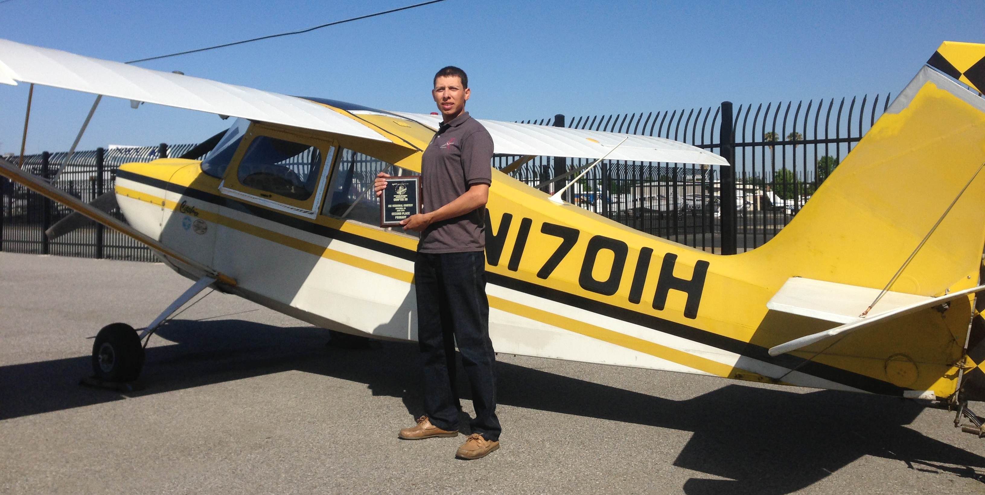 Mark Guerrero beside acro Citabria 1701H