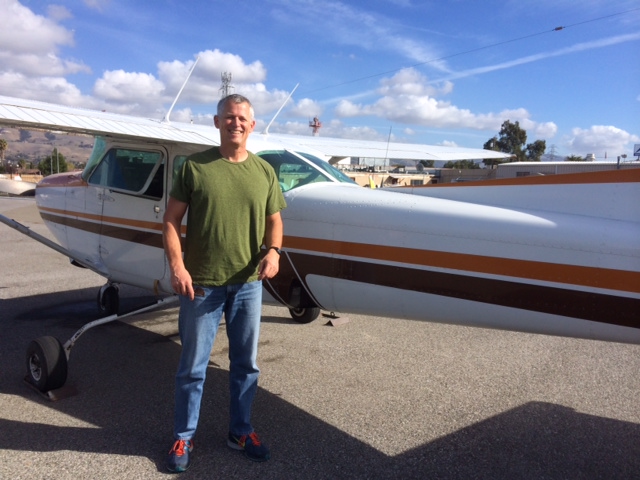 The dashing smile of a brand new commercial pilot! 