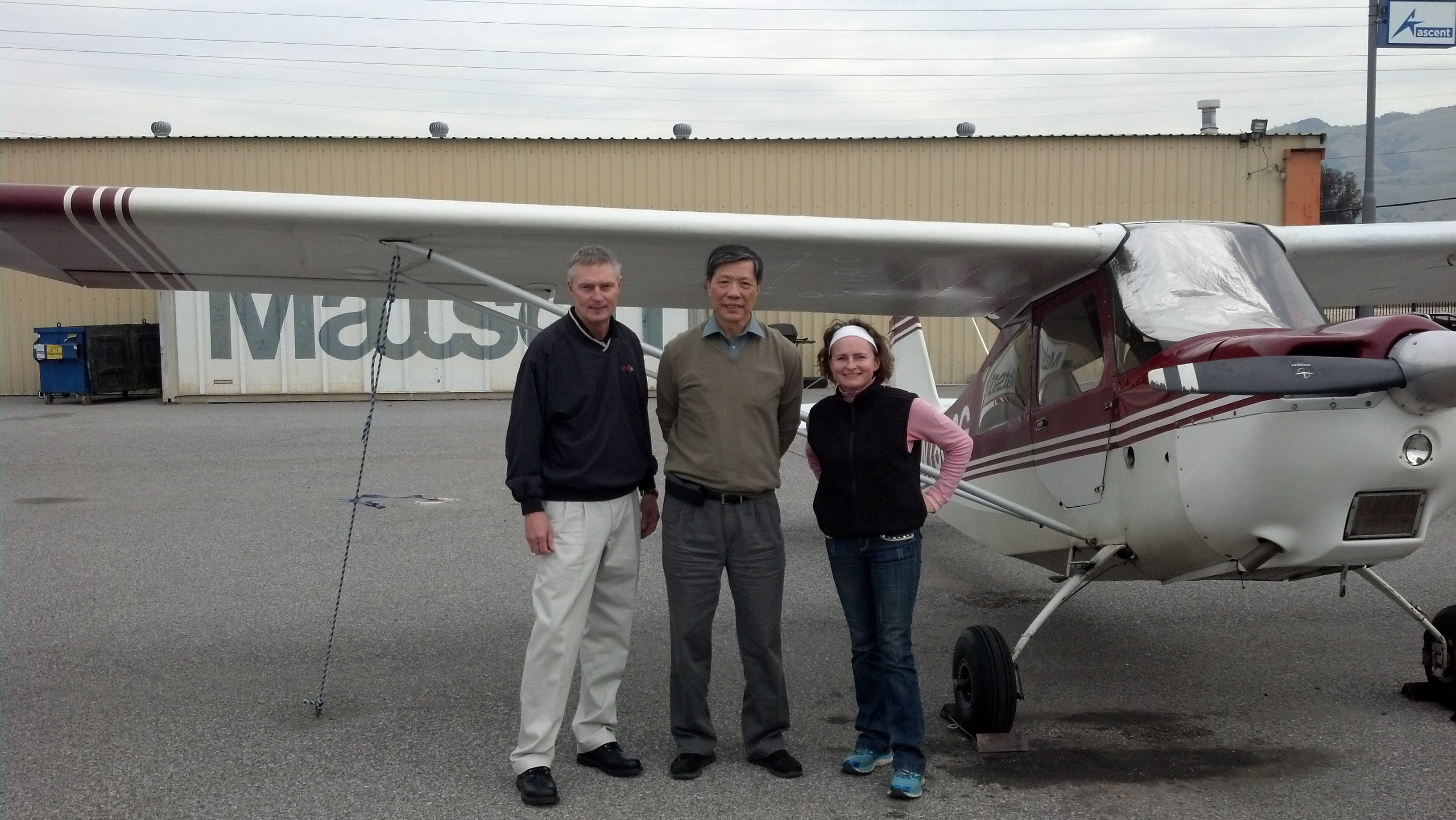 CFI Grainne Gilvarry joins DPE Scott Rohlfing and Ching Lee after a well executed checkride flight