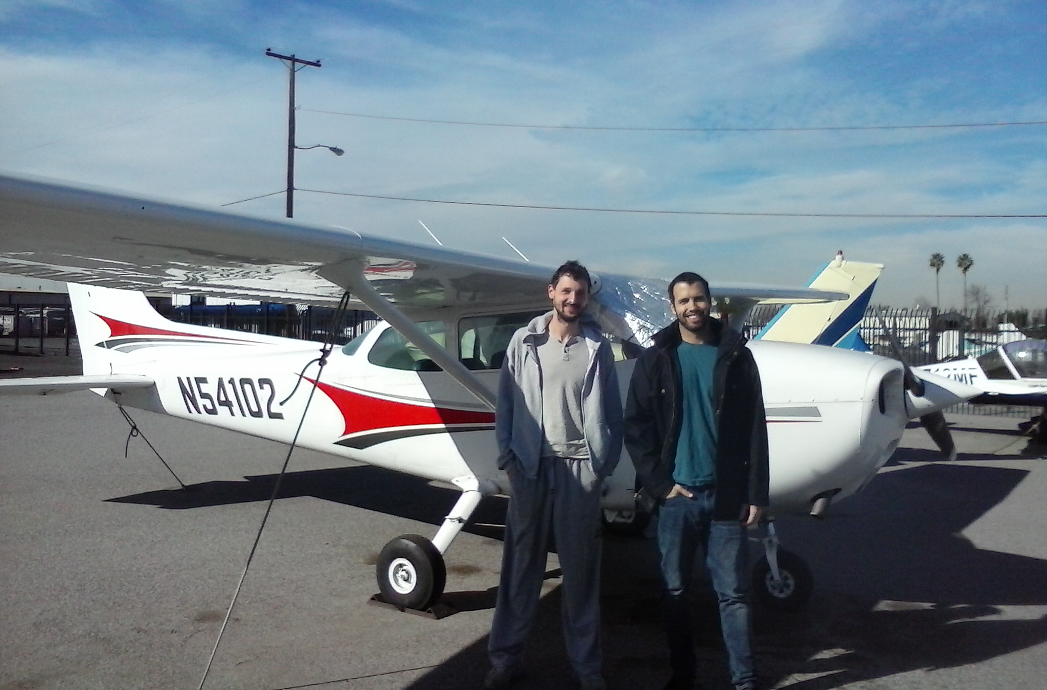 Dmitry Nikiforov and CFI Zach Sacchette after the well executed first solo!