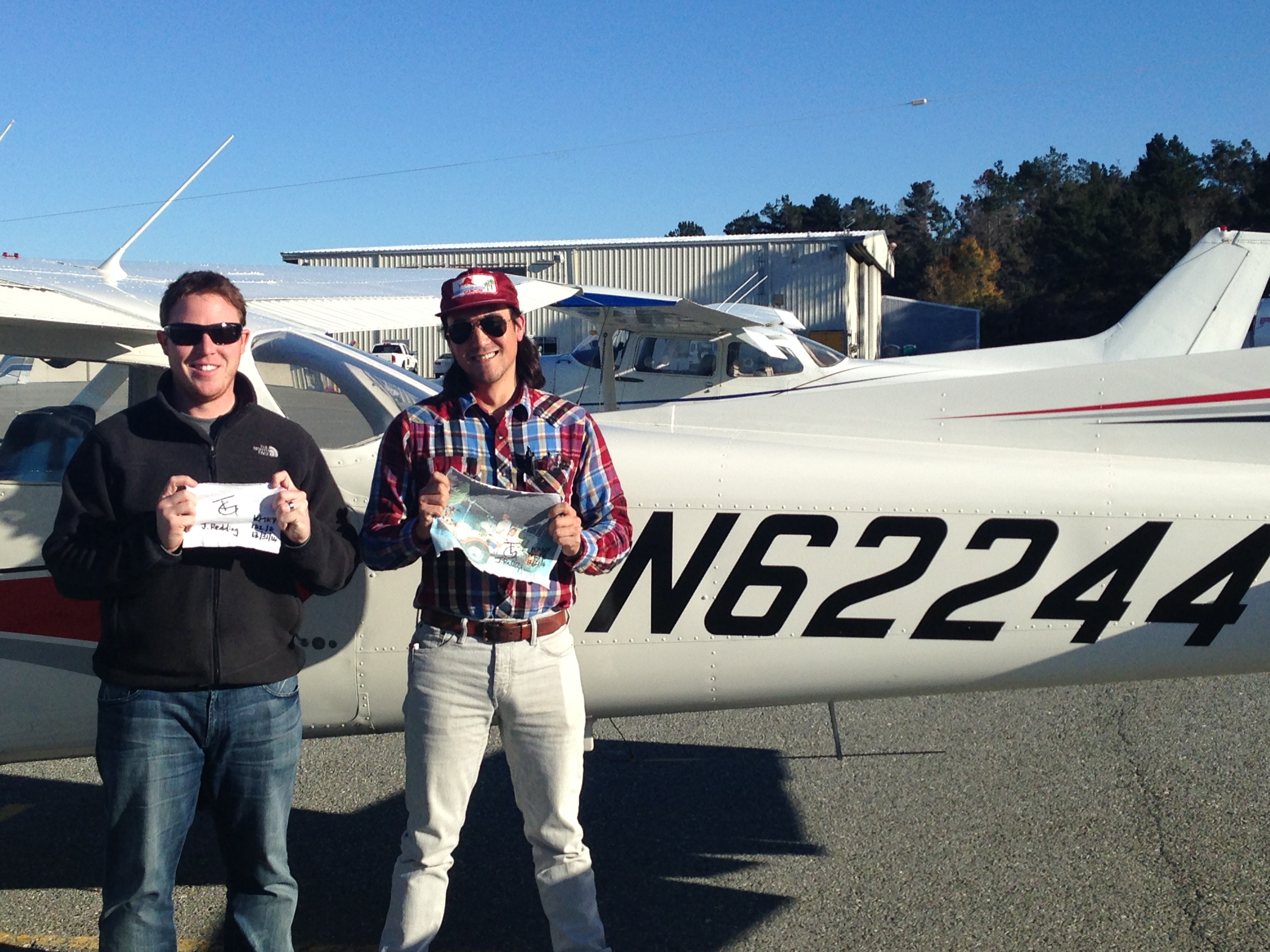 Travis Geske proudly showing off his solo shirt with CFI Jamie Redding 